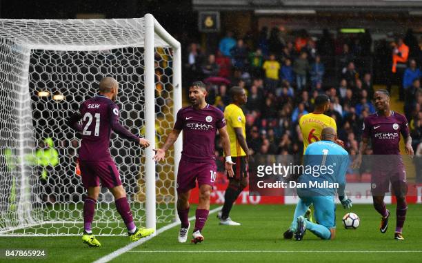 Sergio Aguero of Manchester City celebrates scoring his sides second goal during the Premier League match between Watford and Manchester City at...