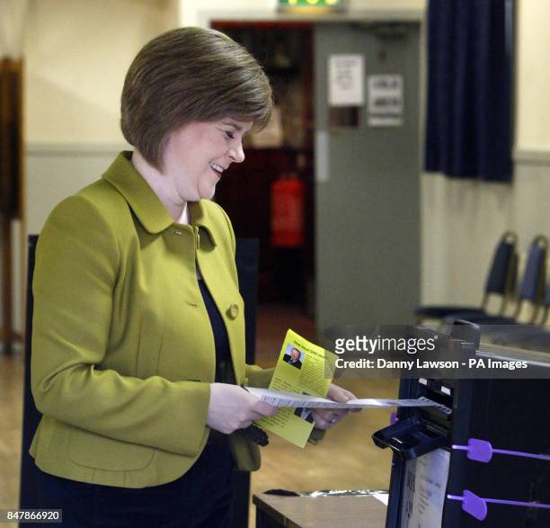 Deputy Leader Nicola Sturgeon casts her vote at Broomhouse Halls polling station in Glasgow, as Scots go to the polls today to elect their local...
