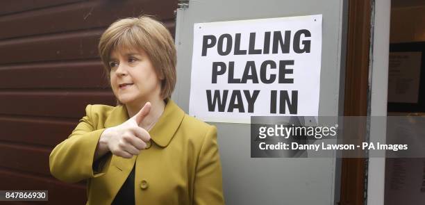 Deputy Leader Nicola Sturgeon arrives to cast her vote at Broomhouse Halls polling station in Glasgow, as Scots go to the polls today to elect their...