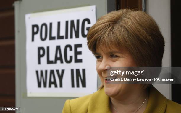 Deputy Leader Nicola Sturgeon arrives to cast her vote at Broomhouse Halls polling station in Glasgow, as Scots go to the polls today to elect their...