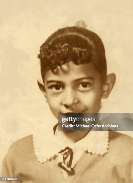 Actress Pam Grier at seven years old poses for a photo circa 1956.