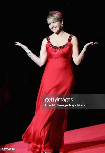 Personality Katie Couric walks the runway wearing Carmen Marc Valvo at The Heart Truth's Red Dress Collection at The Tent in Bryant Park on February...