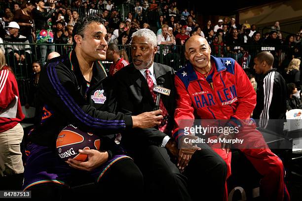 Los Angeles Lakers legend Rick Fox interviews NBA legend Julius Erving and Harlem Globetrotter Curly Neal during the McDonald's All-Star Celebrity...