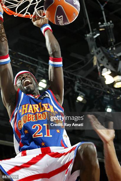 Special K Daley of the Harlem Globetrotters dunks during the McDonald's All-Star Celebrity Game on center court during NBA Jam Session Presented by...