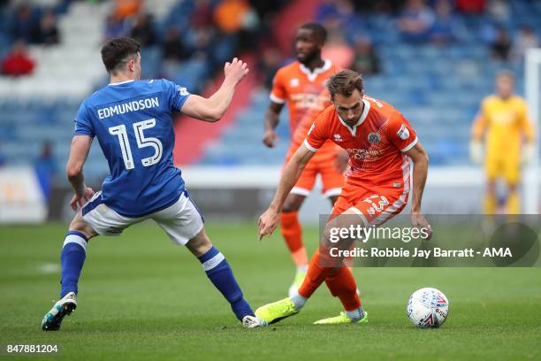 George Edmundson of Oldham Athletic and Alex Rodman of Shrewsbury Town during the Sky Bet League One match between Oldham Athletic and Shrewsbury...