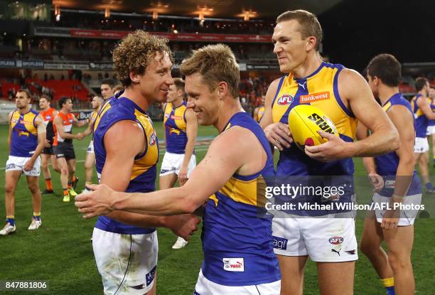 Matt Priddis, Sam Mitchell and Matt Priddis of the Eagles leave the field after their final matches during the 2017 AFL First Semi Final match...