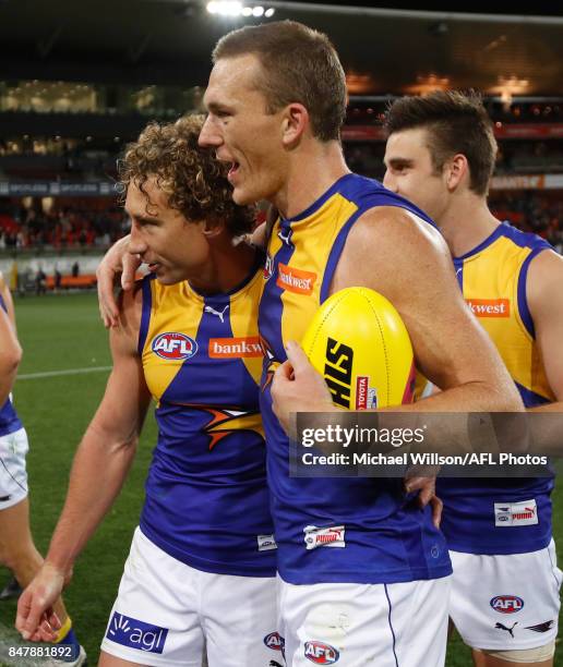 Matt Priddis and Drew Petrie of the Eagles embrace during the 2017 AFL First Semi Final match between the GWS Giants and the West Coast Eagles at...