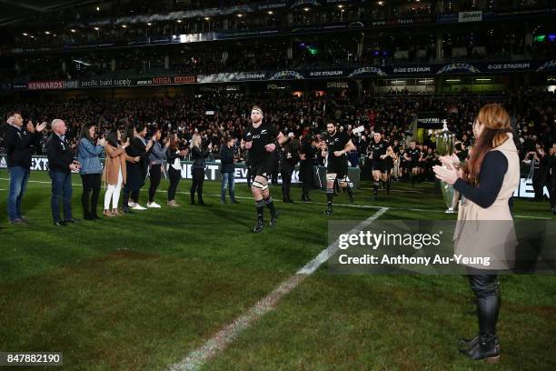 Kieran Read of the All Blacks runs on to the field for the second half as the Black Ferns and Black Ferns Sevens lineup a guard of honour during the...