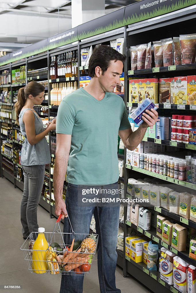 Couple shopping in supermarket
