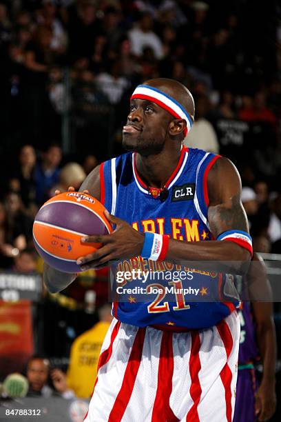 Harlem Globetrotter Special K Daley shoots during the McDonald's All-Star Celebrity Game on center court during NBA Jam Session Presented by Adidas...