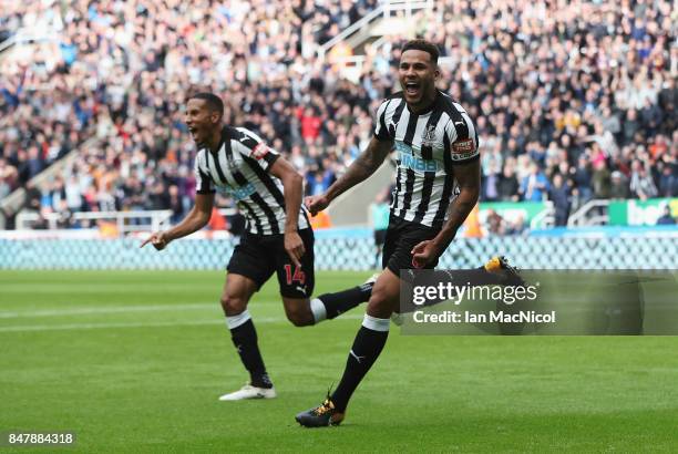 Jamaal Lascelles of Newcastle United celebrates scoring his sides second goal during the Premier League match between Newcastle United and Stoke City...