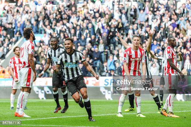 Jamaal Lascelles of Newcastle United celebrates after he heads the ball to score Newcastle's second goal during the Premier League match between...
