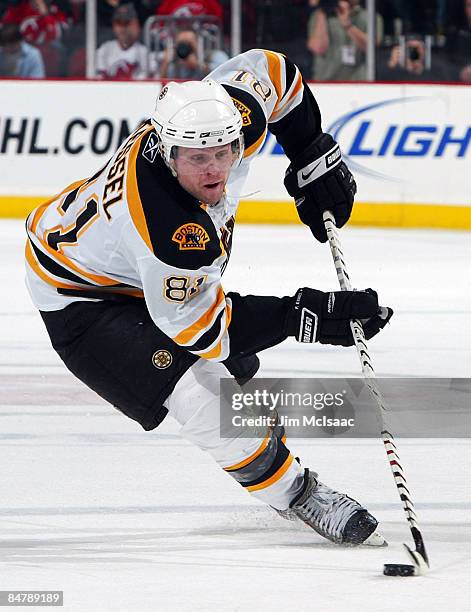 Phil Kessel of the Boston Bruins skates against the New Jersey Devils at the Prudential Center on February 13, 2009 in Newark, New Jersey.