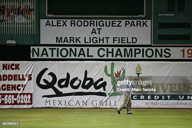 Young boy plays catch while New York Yankees third baseman Alex Rodriguez speaks at a ceremony to name from Marc Light Field to Alex Rodriguez Park...