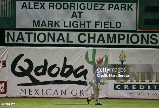 Young boy plays catch while New York Yankees third baseman Alex Rodriguez speaks at a ceremony to name from Marc Light Field to Alex Rodriguez Park...