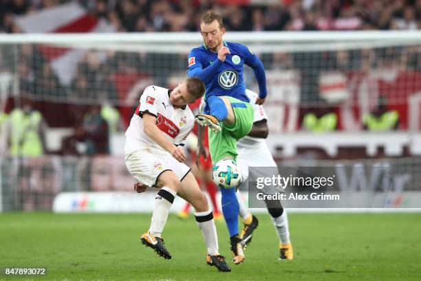 Santiago Ascacibar of Stuttgart fights for the ball with Maximilian Arnold of Wolfsburg during the Bundesliga match between VfB Stuttgart and VfL...