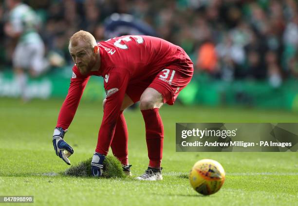 Ross Countys goalkeeper Aaron McCarey points to the pitch during the Ladbrokes Scottish Premiership match at Celtic Park, Glasgow.