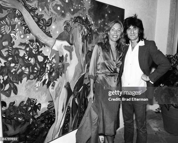 Joni Mitchell and Ronnie Wood at an art gallery for one of Joni's exhibitions in Los Angeles, California. **EXCLUSIVE**