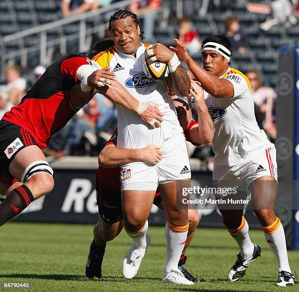 Sione Lauaki of the Chiefs is tackled during the round one Super 14 match between the Crusaders and the Chiefs at AMI Stadium on February 14, 2009 in...