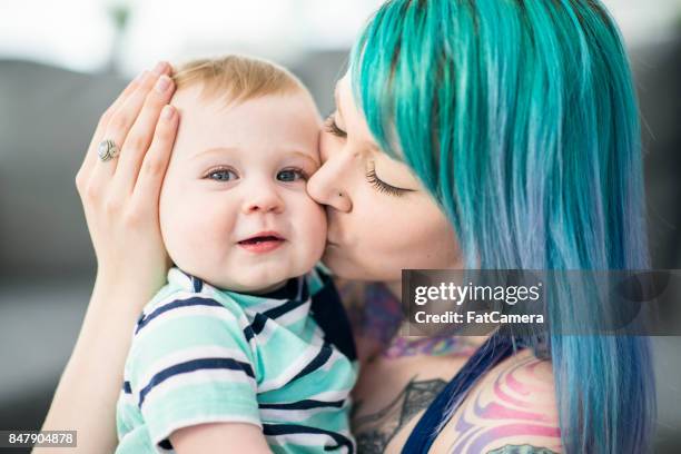 kissing baby - septum stock pictures, royalty-free photos & images