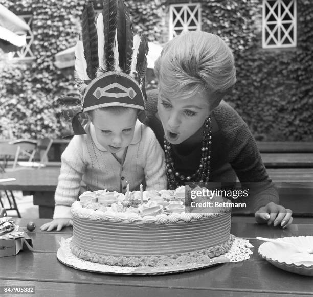Shaun Cassidy blows out the candles on his second birthday cake with the help of his famous mother, actress Shirley Jones, in Nye York. Shirley’s...