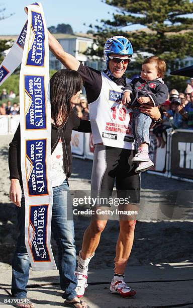 Gordon Walker of Auckland crosses the finish line with his wife Viv and daughter Stella after winning the Longest Day during the Speight`s Coast To...