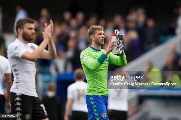 Leeds United's Felix Wiedwald applauds the fans at the final whistle during the Sky Bet Championship match between Millwall and Leeds United at The...