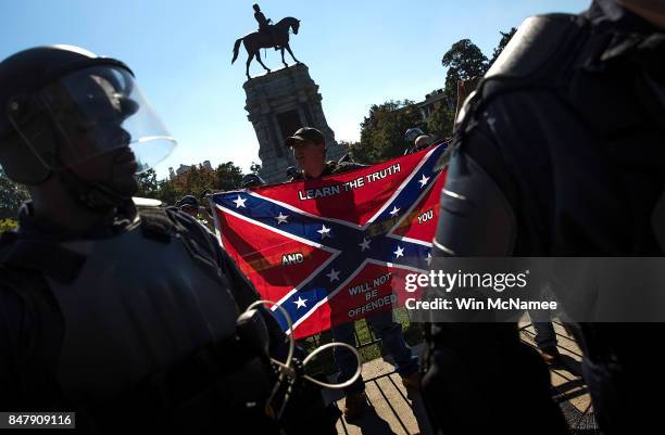 Richmond police keep members of the Tennessee based group "New Confederate State of America" separated from counter protesters September 16, 2017 in...
