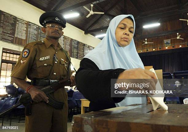 Sri Lankan woman voter casts her ballot at a key local election in the central district of Kandy on February 14, 2009. Sri Lanka is holding elections...