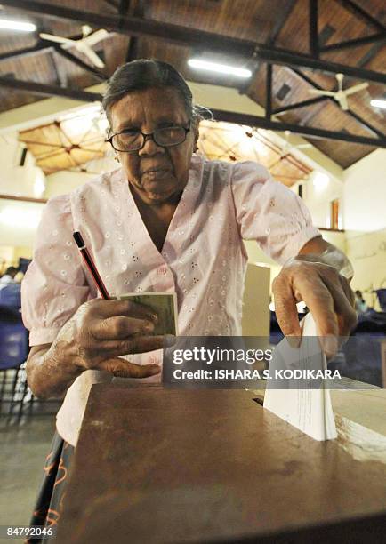 Sri Lankan woman voter casts her ballot at a key local election in the central district of Kandy on February 14, 2009. Sri Lanka is holding elections...