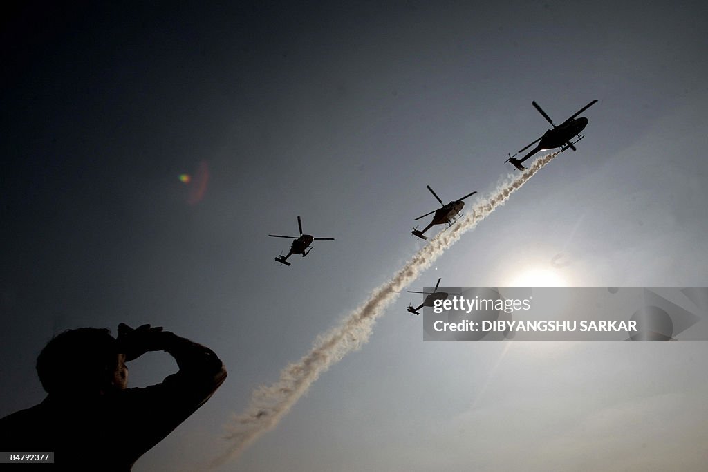 Airshow visitors look on as the Indian A
