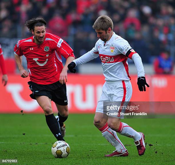 Christian Schulz of Hannover challenges Thomas Hitzlsperger of Stuttgart during the Bundesliga match between Hannover 96 and VfB Stuttgart at the AWD...