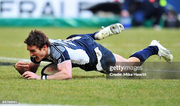 Thom Evans of Scotland crosses for his team's only try during the RBS Six Nations Championship match between France and Scotland at the Stade de...