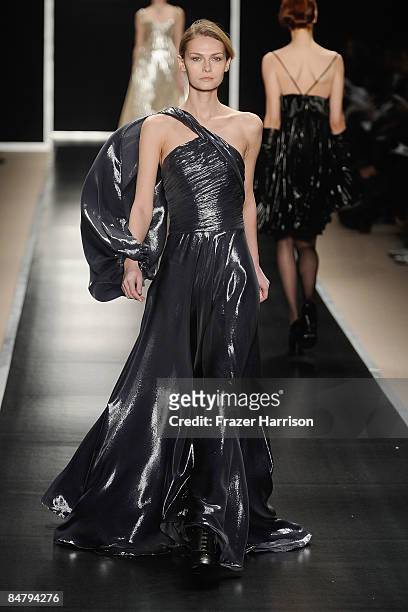 Model walks the runway at the Edition By Georges Chakra Fall 2009 fashion show during Mercedes-Benz Fashion Week in the Promenade at Bryant Park on...