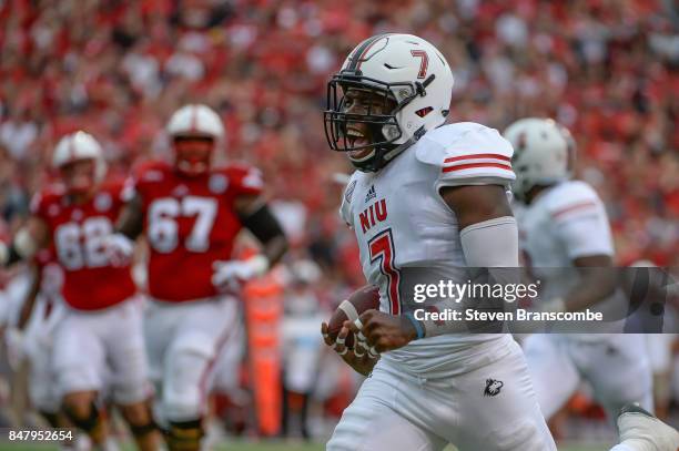 Linebacker Jawuan Johnson of the Northern Illinois Huskies celebrates after scoring against the Nebraska Cornhuskers at Memorial Stadium on September...