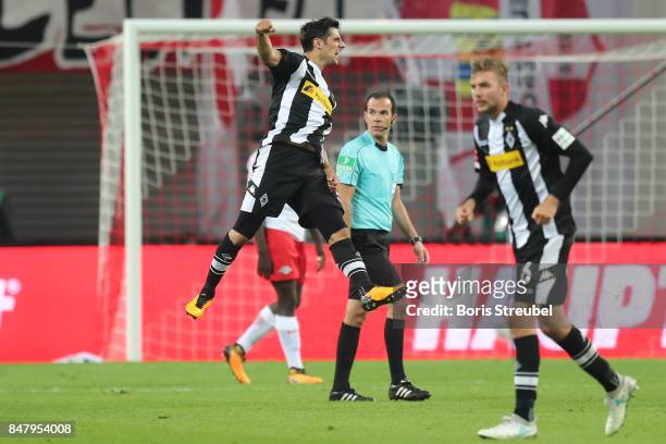 Lars Stindl of Moenchengladbach celebrates after he scored his teams second goal to make it 2:2 during the Bundesliga match between RB Leipzig and...