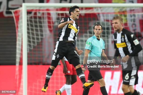 Lars Stindl of Moenchengladbach celebrates after he scored his teams second goal to make it 2:2 during the Bundesliga match between RB Leipzig and...