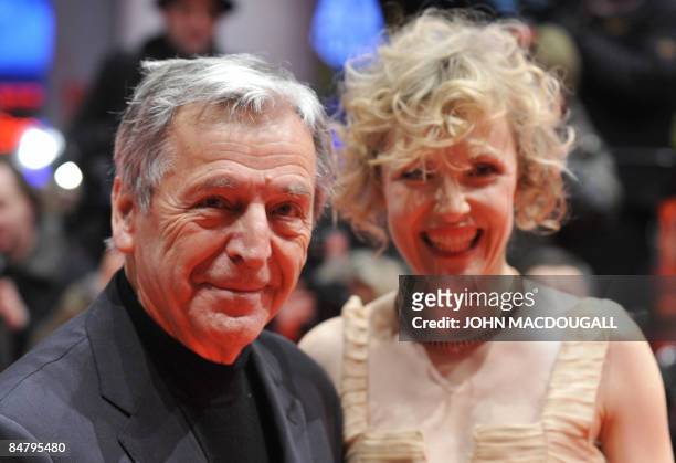 French director Costa-Gavras and German actress Juliane Koehler pose for photographers on the red carpet before the awards ceremony of the 59th...