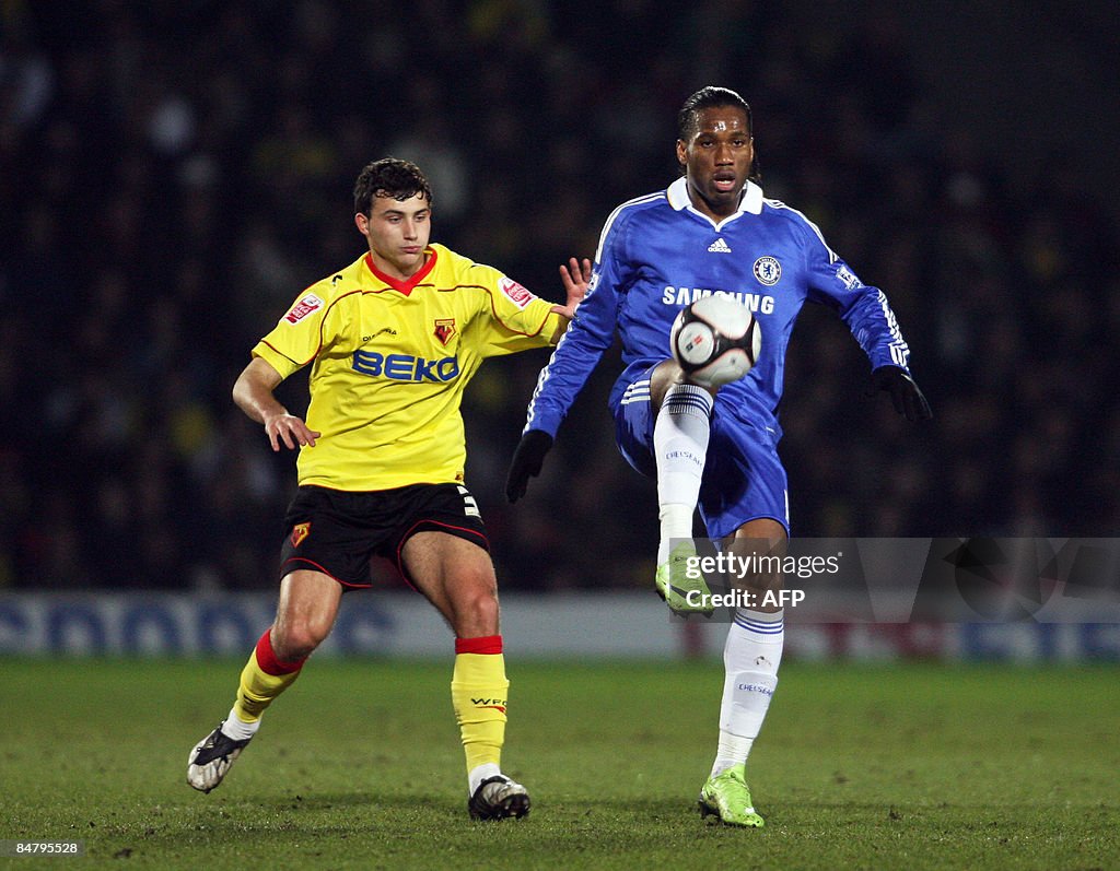 Watford's Ross Jenkins (L) in action aga