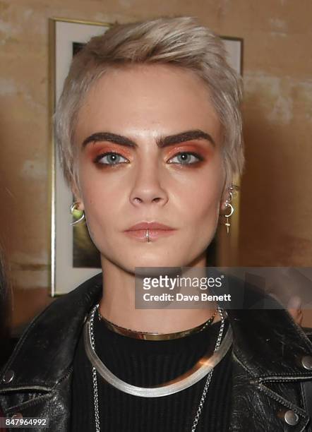 Cara Delevingne wearing Burberry at the Burberry September 2017 at London Fashion Week at The Old Sessions House on September 16, 2017 in London,...