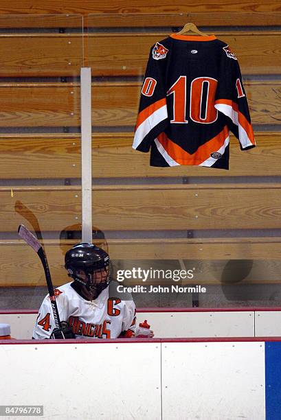 The jersey of Buffalo State University Alumni Madeline Loftus hangs in her honor at the Alumni hockey game that she was to participate in February...