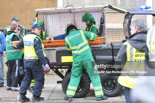 Paramedics use a Polaris 6x6 atv ambulance during a demonstration in Luton town centre.