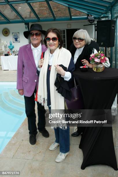 Andre Chapelle, Nana Mouskouri and wardrobe Mine Barral-Vergez attend the Garden Party organized by Bruno Finck, companion of Jean-Claude Brialy, at...