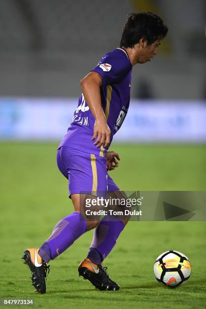 Tsukasa Shiotani of Al Ain in action during the Arabian Gulf League match between Al Ain and Al Wasl at Khalifa bin Zayed Stadium on September 16,...