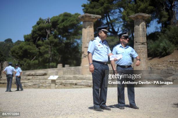 Greek police at the Temple of Hera in Olympia, Greece, where the ancient Olympic Games took place, during a rehearsal for tomorrow's Olympic Flame...