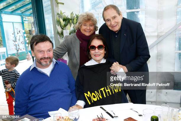 Bruno Finck, Jacqueline Franjoux, Nana Mouskouri and Robert Hossein attend the Garden Party organized by Bruno Finck, companion of Jean-Claude...