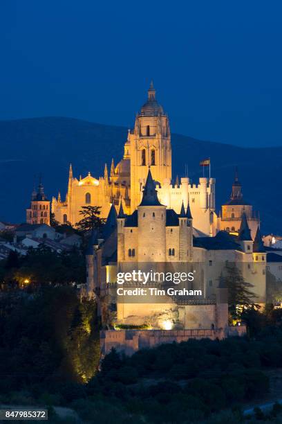 Famous spectacular view of Alcazar Castle - palace and fortress which inspired Disney castle, and Cathedral in Segovia, Spain.