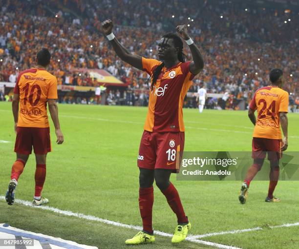 Gomis of Galatasaray celebrates with his teammates after scoring a goal during the fifth week of the Turkish Super Lig soccer match between...