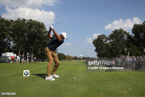 Jason Day of Australia hits his tee shot on the third hole during the third round of the BMW Championship at Conway Farms Golf Club on September 16,...