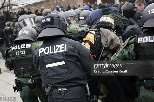 German riot police block left-wing protestors during a rally against a far-right march on February 14, 2009 in Dresden, Germany. Reportedly over...